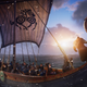 Vikings from Assassin's Creed Valhalla set sail in a long boat as the sun goes down.